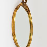 Round wall mirror in gilded wood, mid-century, C. Allodi & G. Subelli, Italy, 1950s.