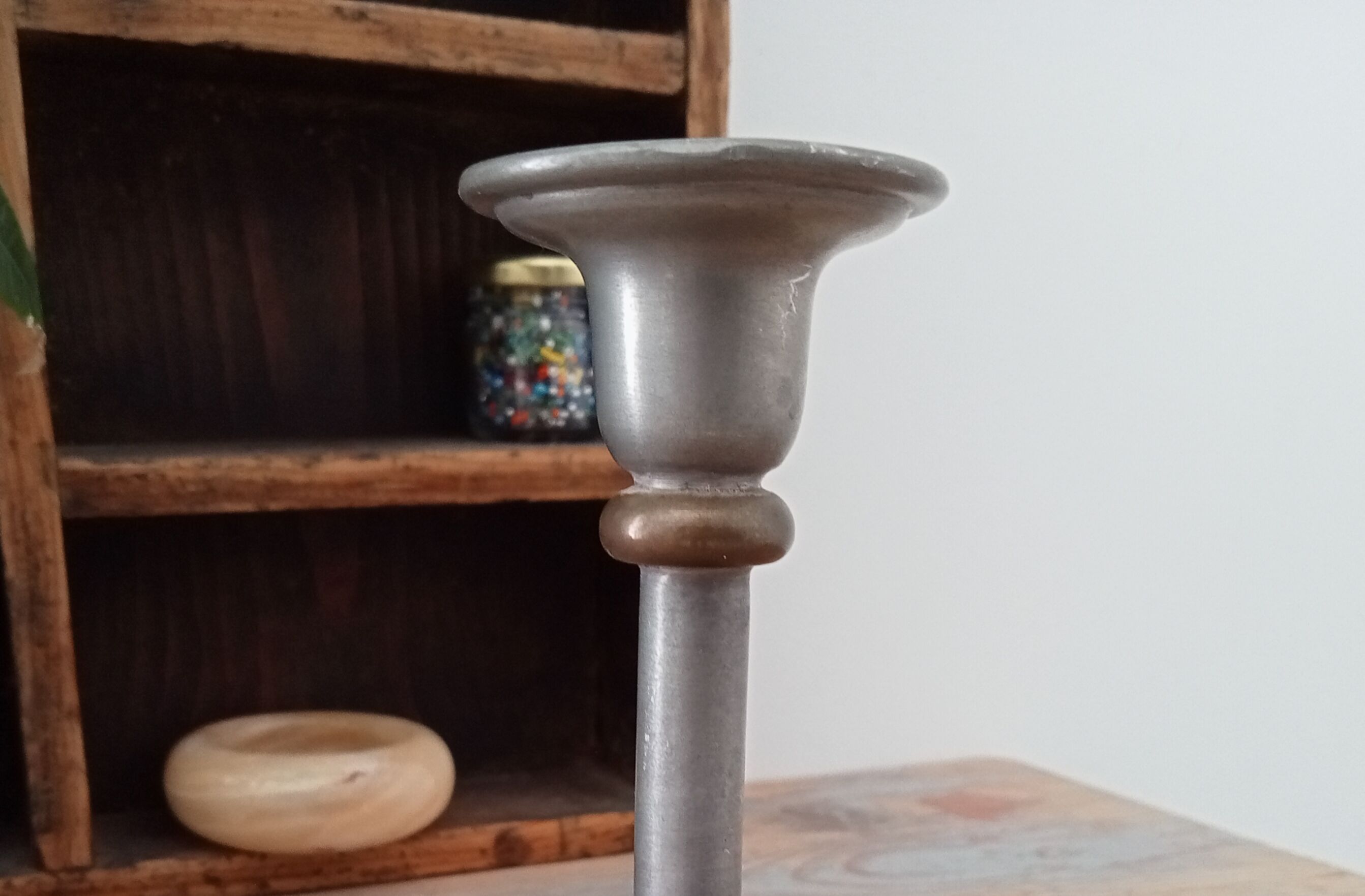 Antique candle holder in pewter and brass