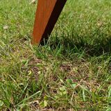 Tall chest of drawers in wood and rattan with splayed legs