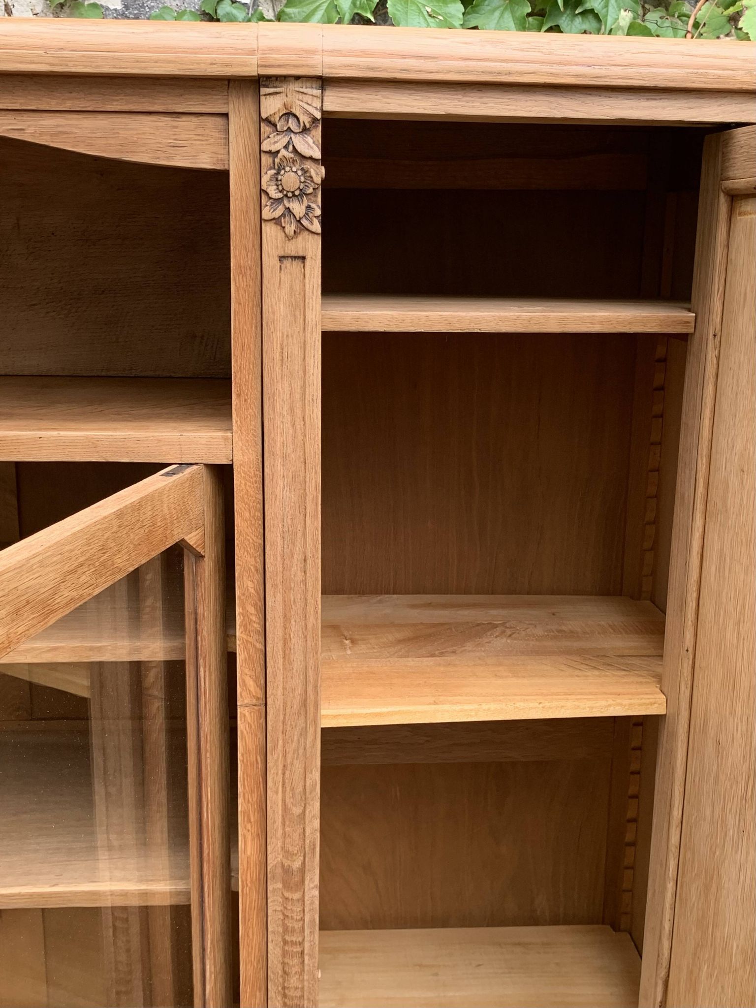 Asymmetrical Art Deco glass-fronted Parisian wardrobe in raw oak, 1930.