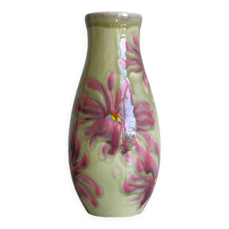 Large signed vase in green ceramic with pink floral motifs.