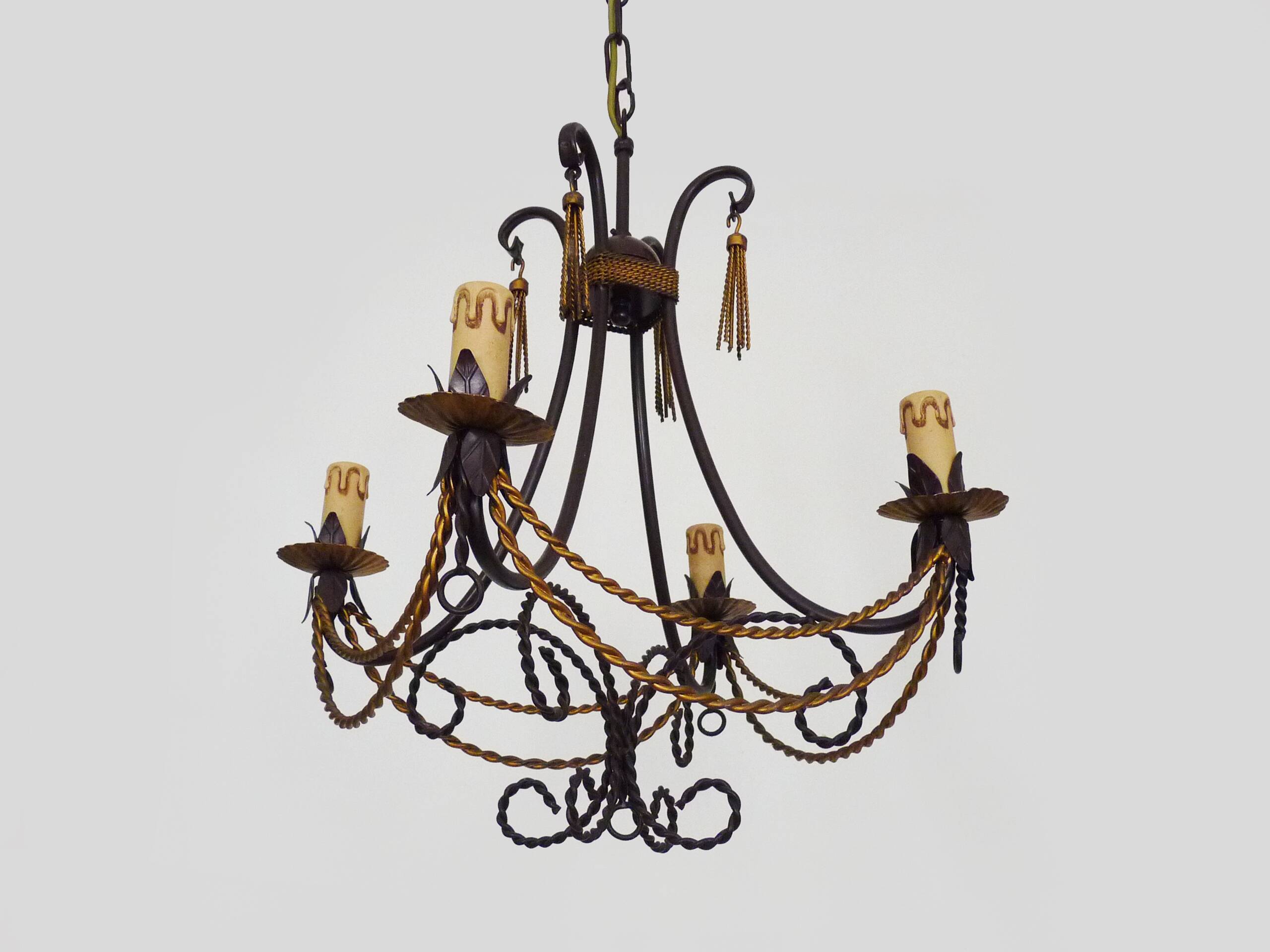 Vintage 4-arm, 4-light chandelier from the 1980s. Brown and gold metal.