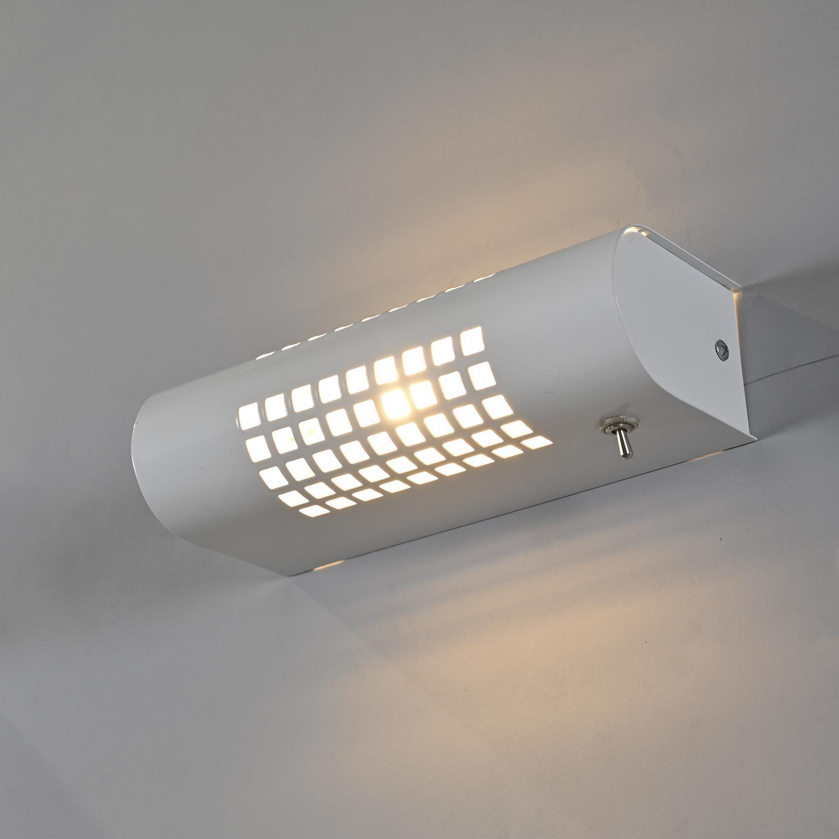 Pair of wall lights by Charlotte Perriand for SCE around 1980.
