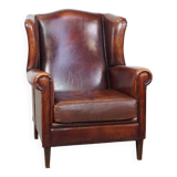 English style sheepskin leather wingback chair in a cognac color