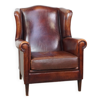 Fauteuil à oreilles en cuir de mouton de style anglais de couleur cognac