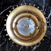 Midcentury brutalist sun wall lamp, metal and gold leaf, Italy