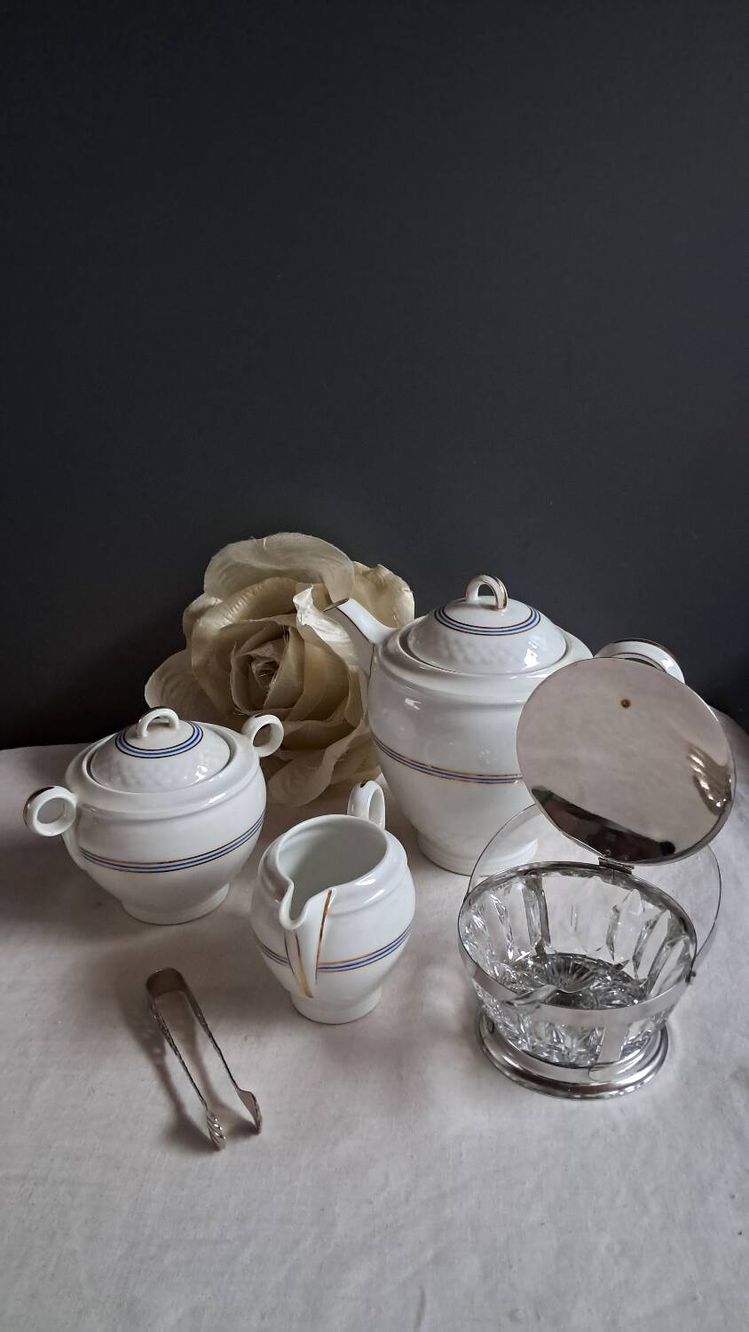 Teapot, sugar bowl, milk jug, jam jar.