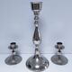 Three vintage metal chrome glass candlesticks