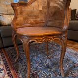 Louis XV style caned armchair
