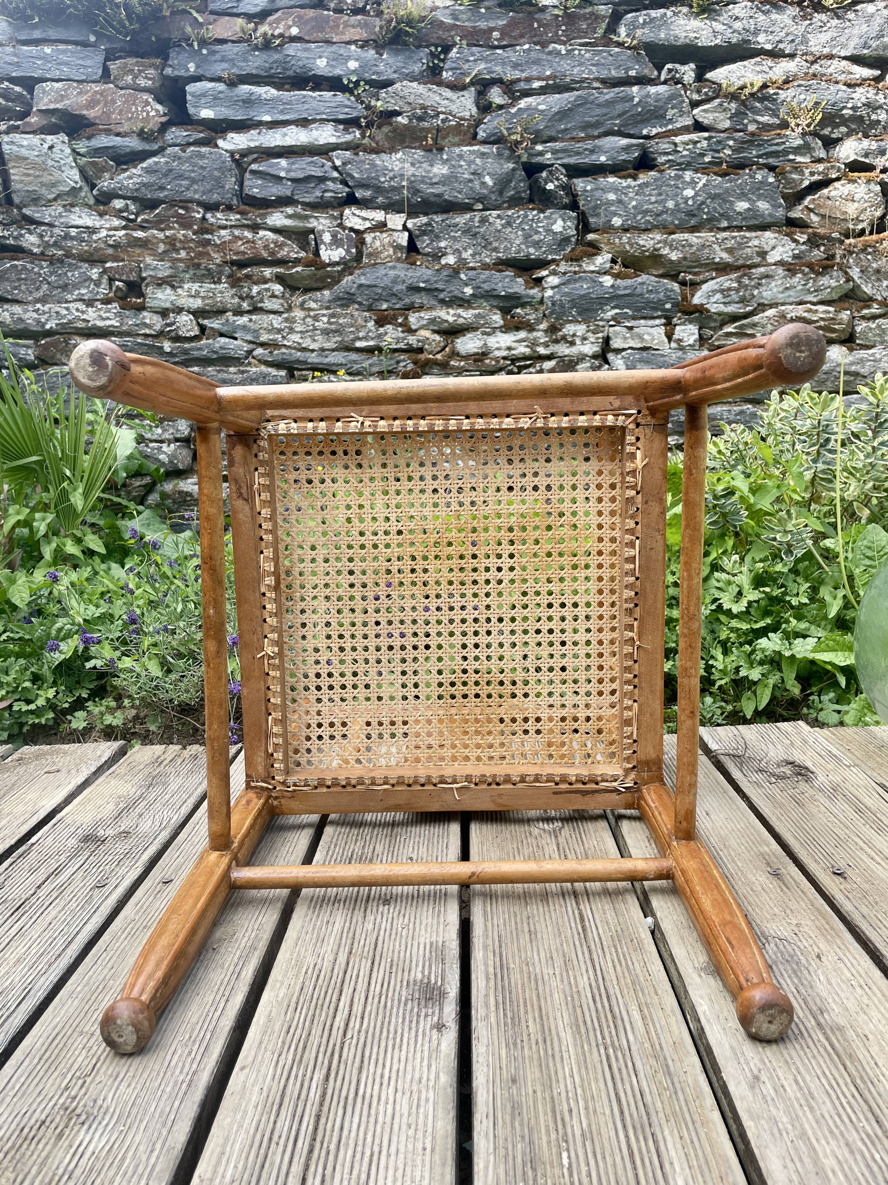 Art Deco corner chair with caning