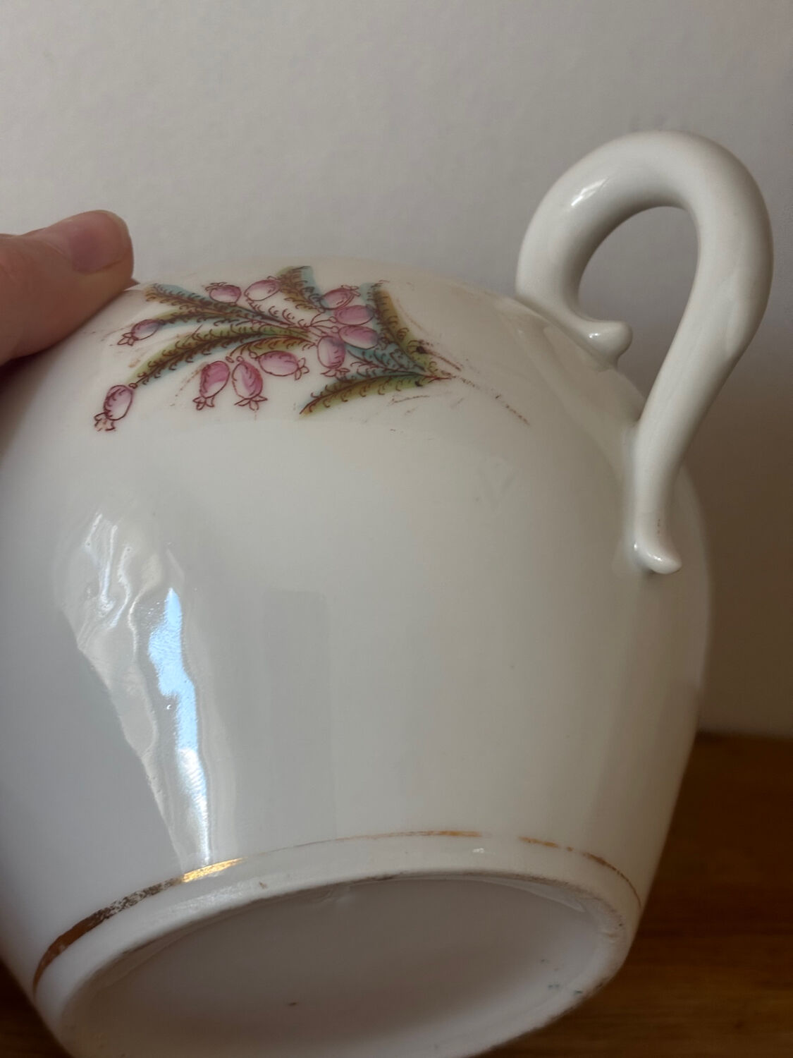 Beautiful vintage porcelain sugar bowl with a floral pattern.