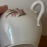 Beautiful vintage porcelain sugar bowl with a floral pattern.