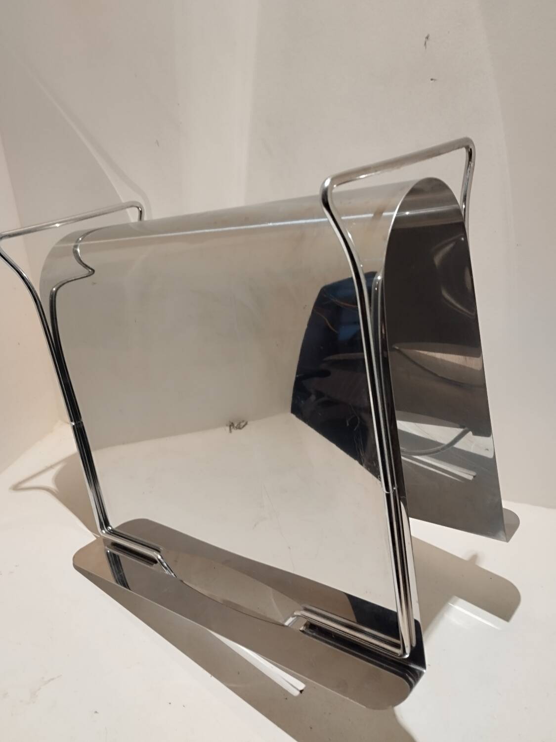 Vintage stainless steel magazine rack