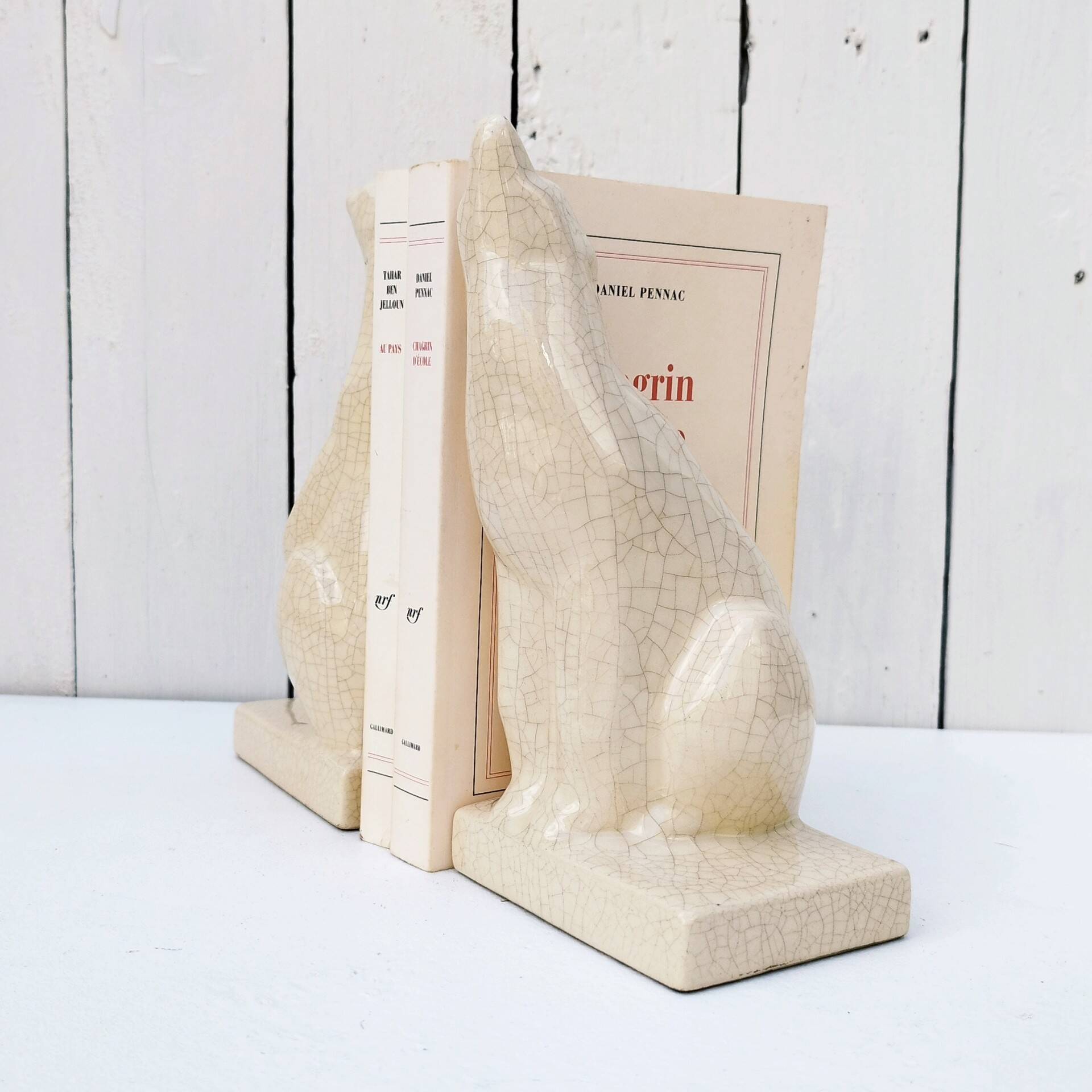 Cracked ceramic bookends with a couple of bears