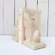 Cracked ceramic bookends with a couple of bears