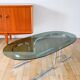 Oval coffee table in smoked glass and chrome, original double S design base, 1970.
