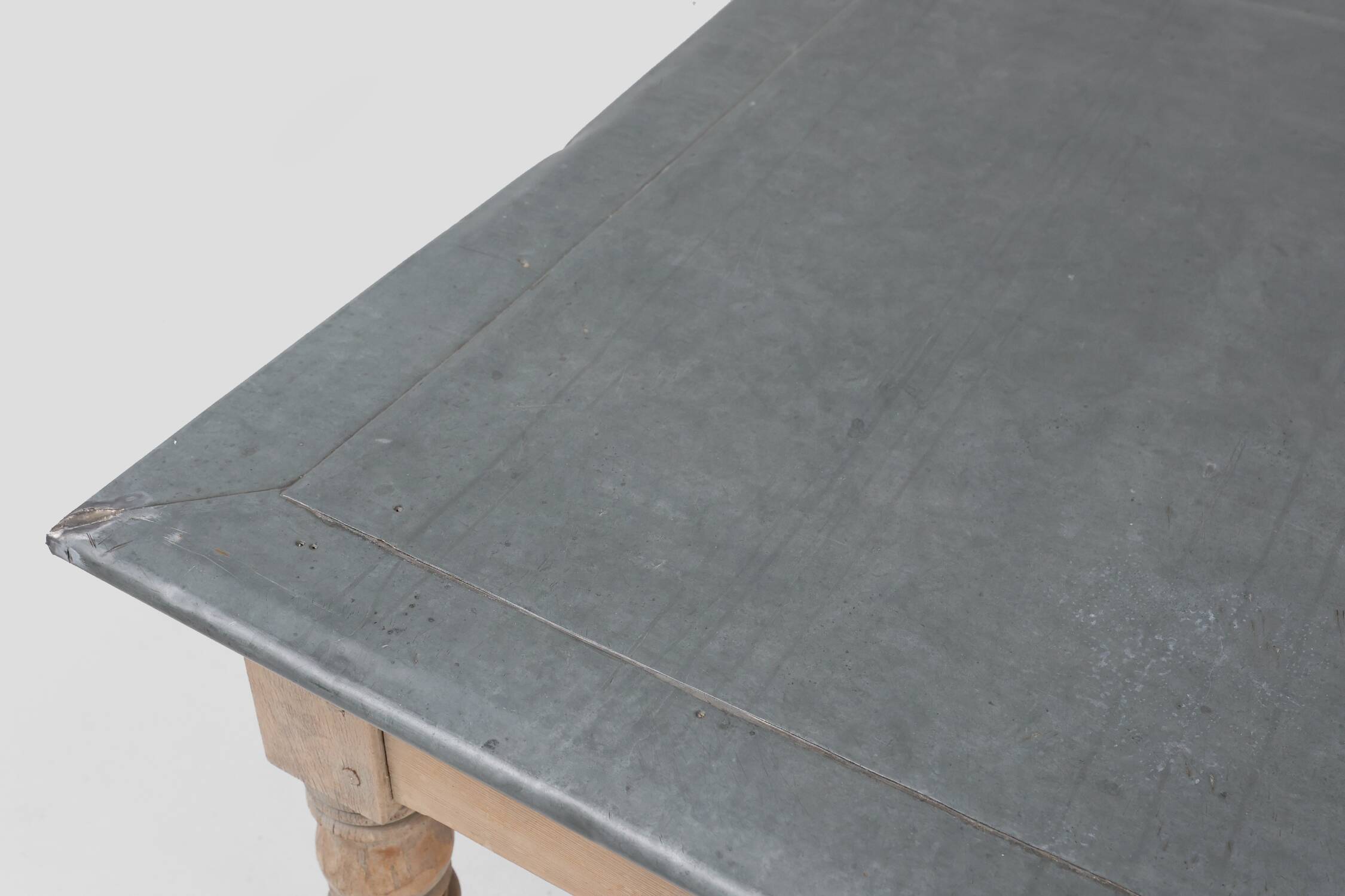 Rustic French pine wood dinner table with zinc top, ca. 1850