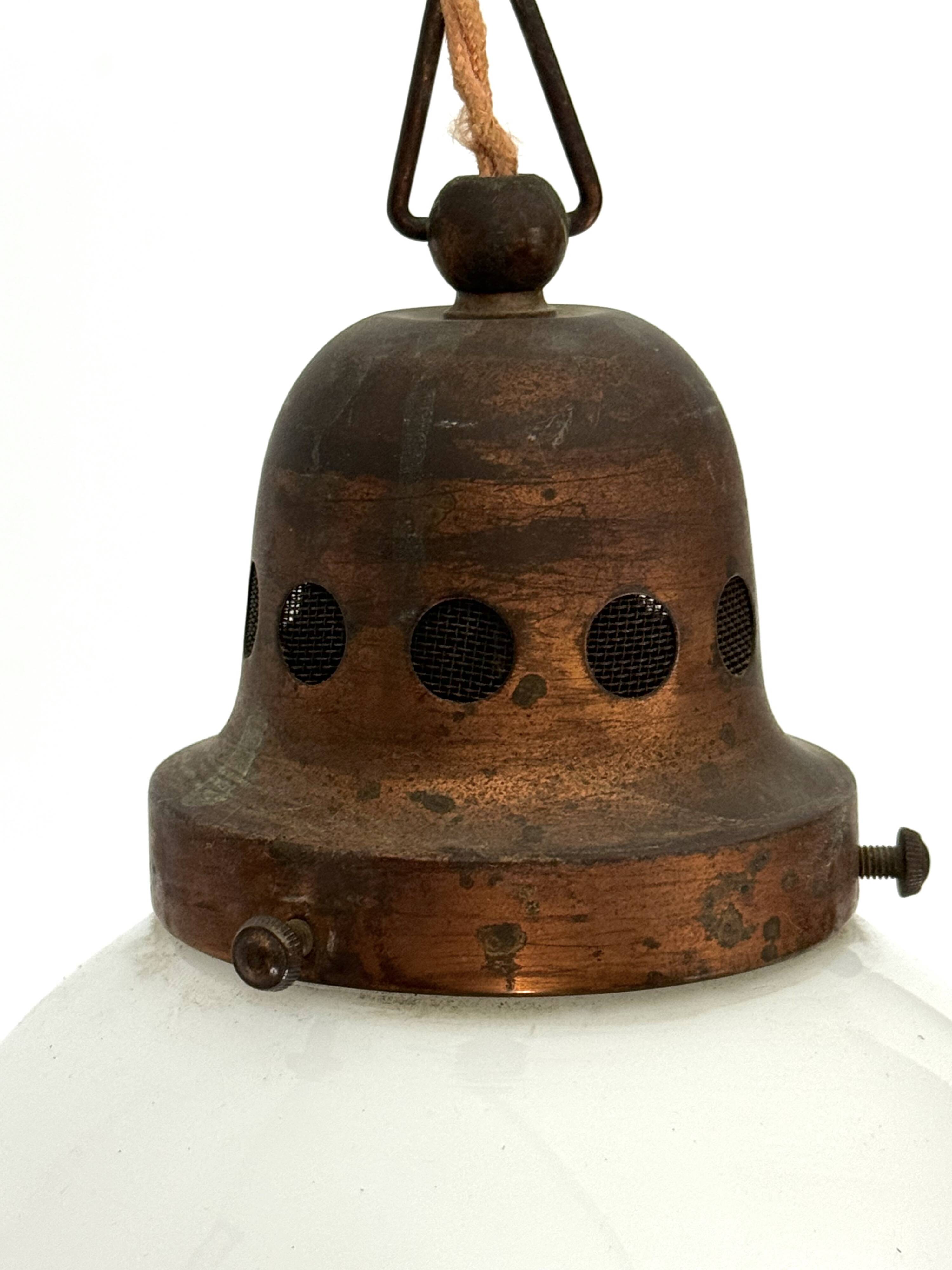 Vintage Industrial chandelier in copper and milk glass. Italy 1950s