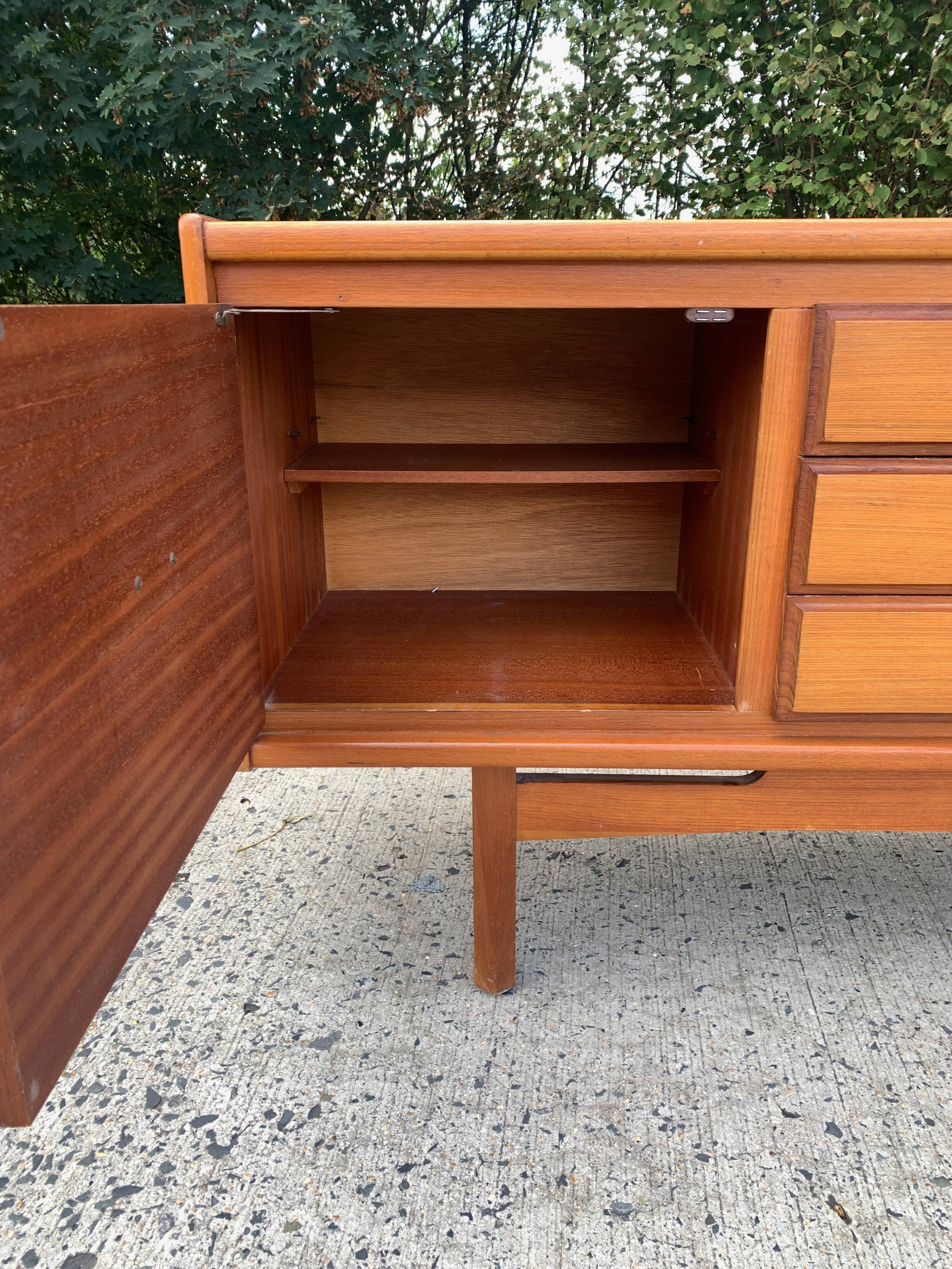 Teak enfilade from the 1970s by the English brand William Laurence.