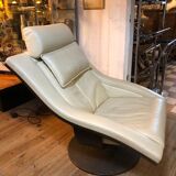 White leather armchair and ottoman