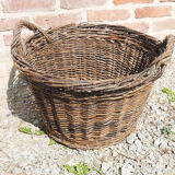 Old round wicker linen basket, dark rattan