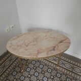 Oval coffee table with marble top