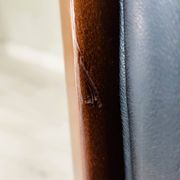 Black leather rocking Chesterfield armchair