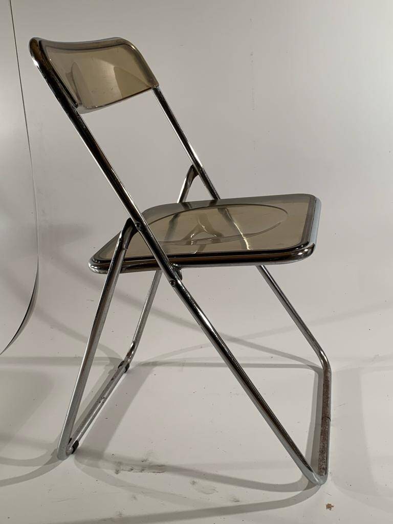 stainless steel and smoked plastic folding chair 70s style
