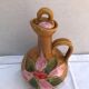 Old carafe with 8 ceramic glasses