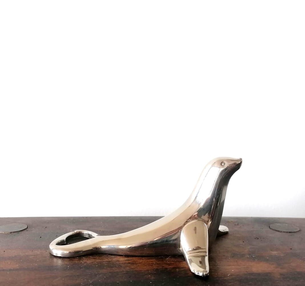 Silver metal seal bottle opener