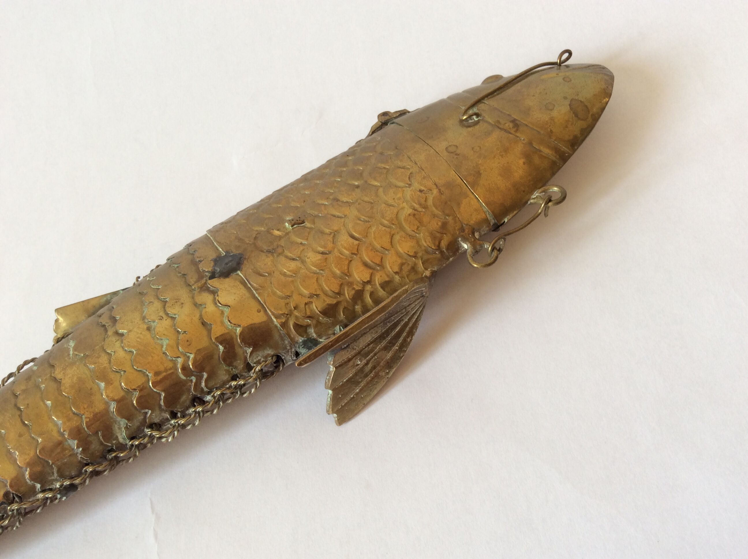 Old articulated brass fish box