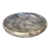 Empty round pocket in gray marble