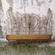 Golden wrought iron bedhead