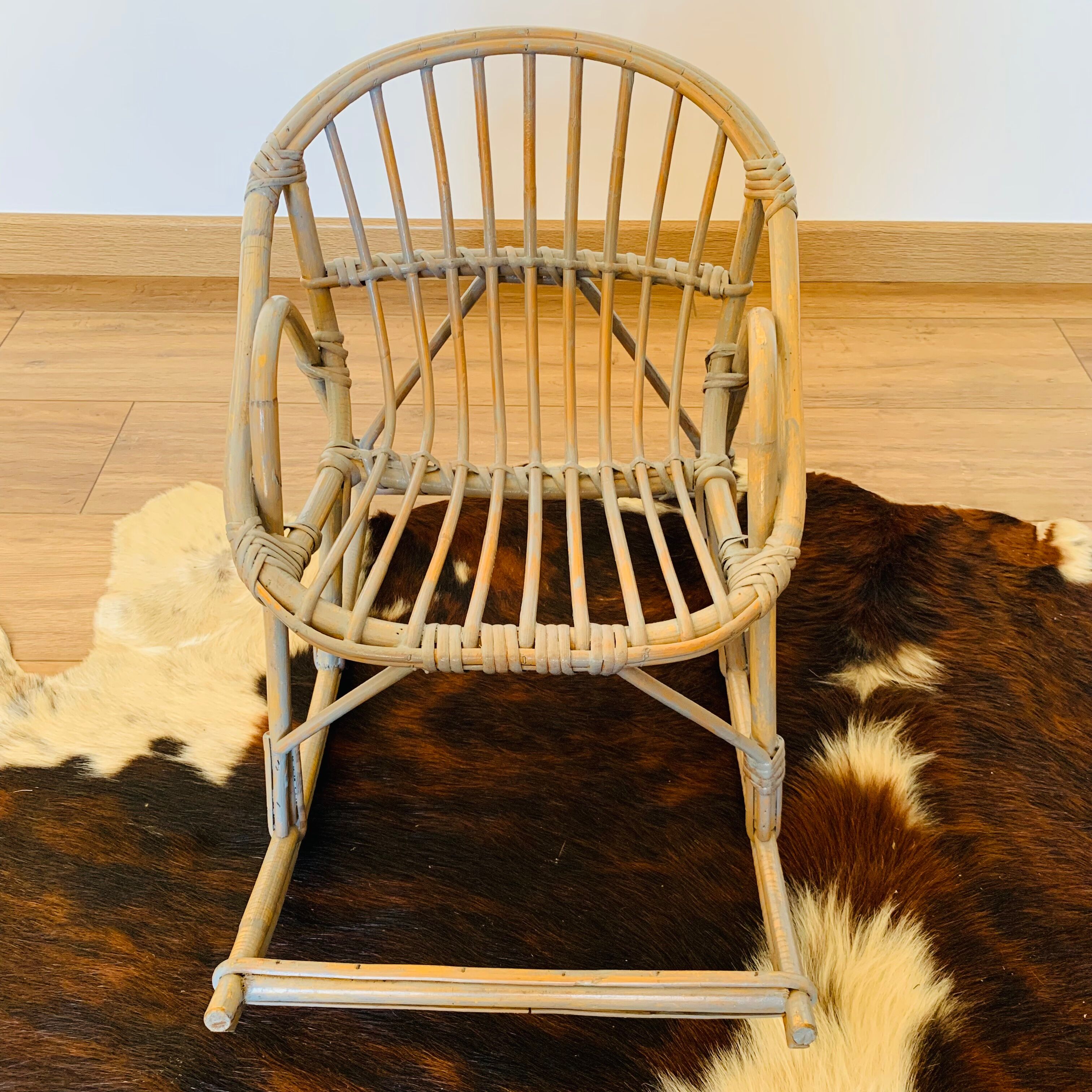 Child's wicker rocking chair, model.