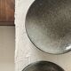 Handmade round ceramic bowls made of Japanese stoneware.