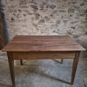 French antique dining table in cherry wood with two drawers, circa 1880–1920.
