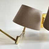articulated brass and velvet wall light