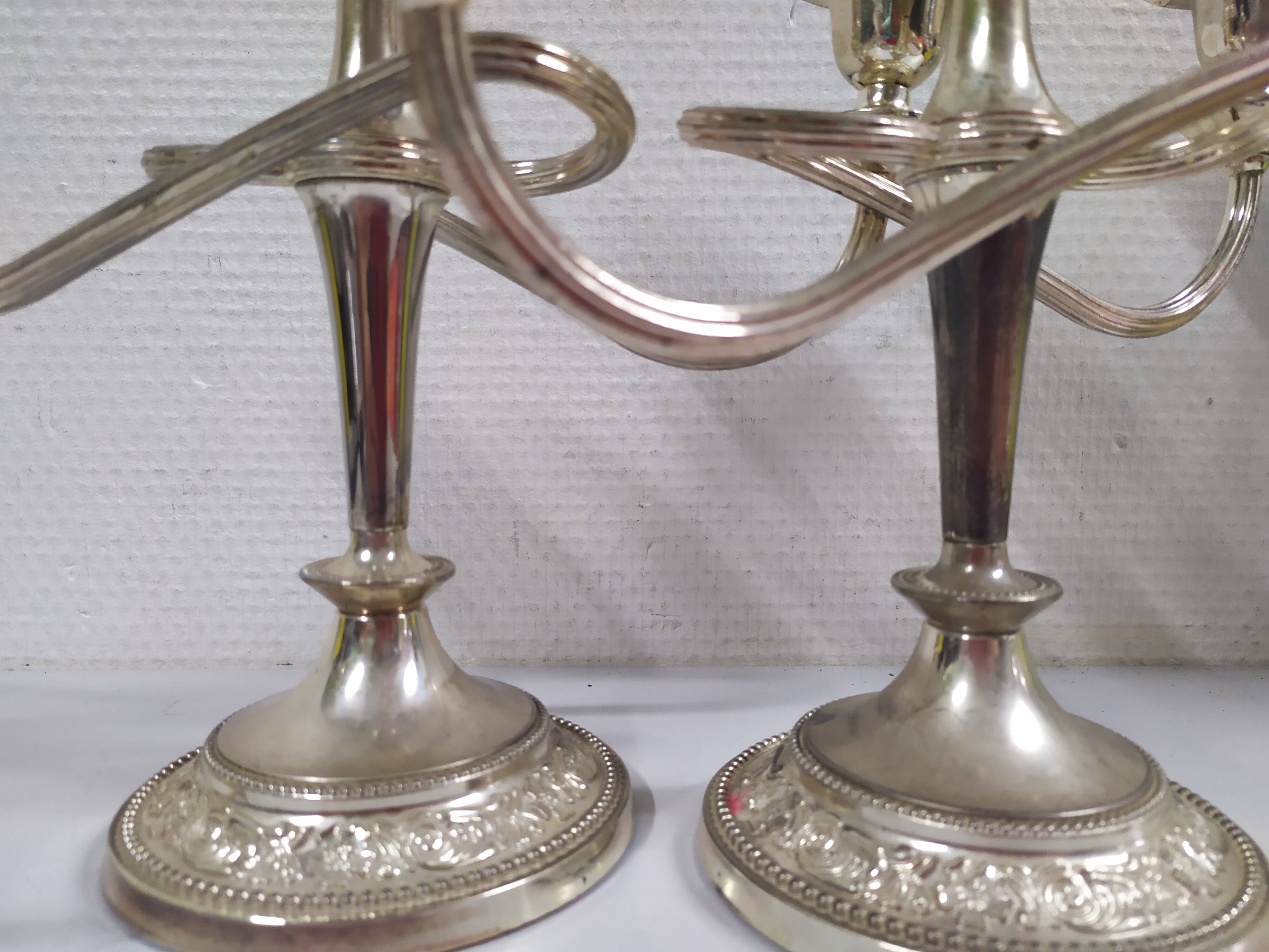 Set of 2 silver metal candlesticks