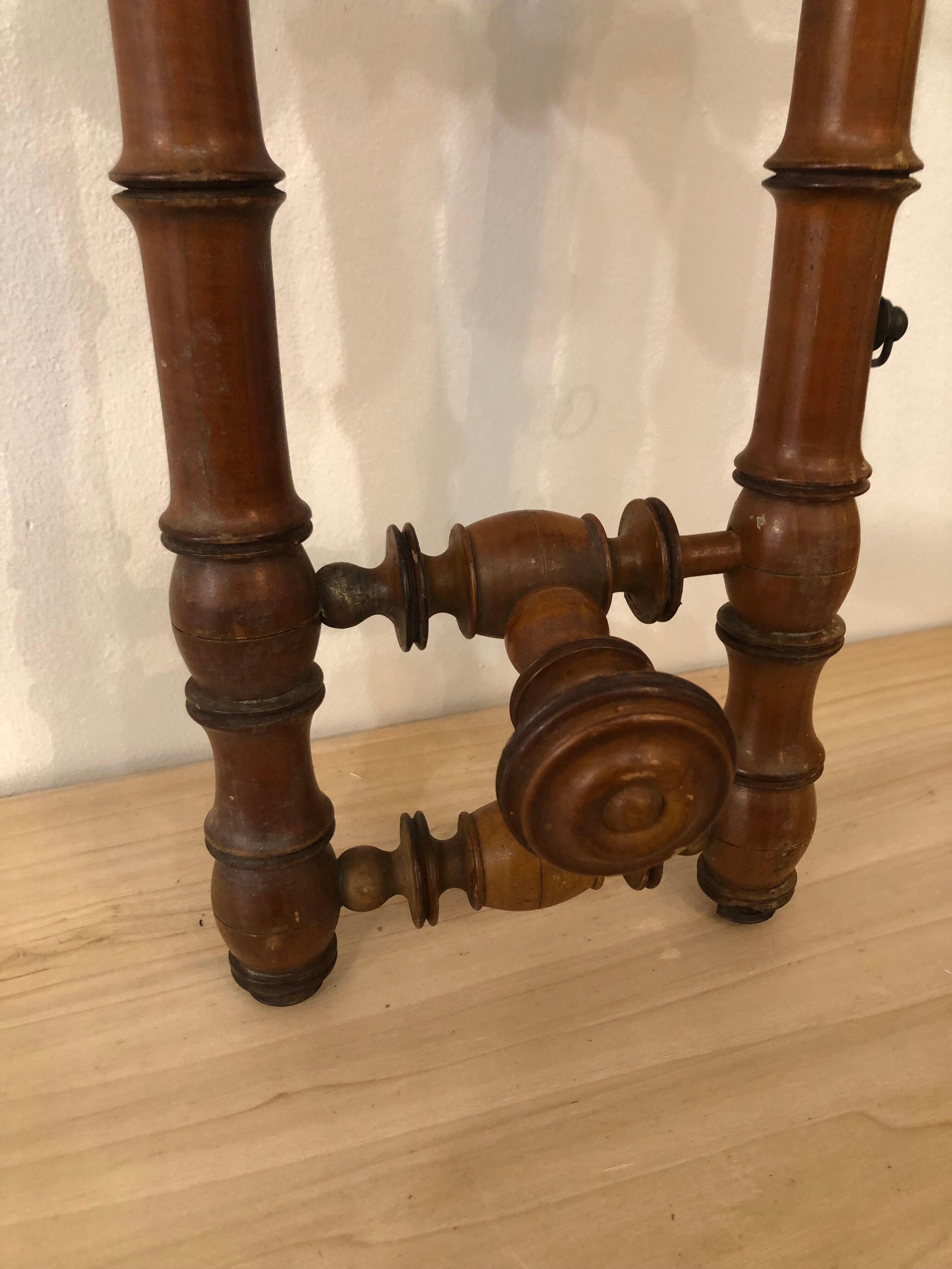 Wooden coat rack with swivel hooks