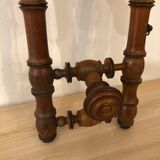 Wooden coat rack with swivel hooks