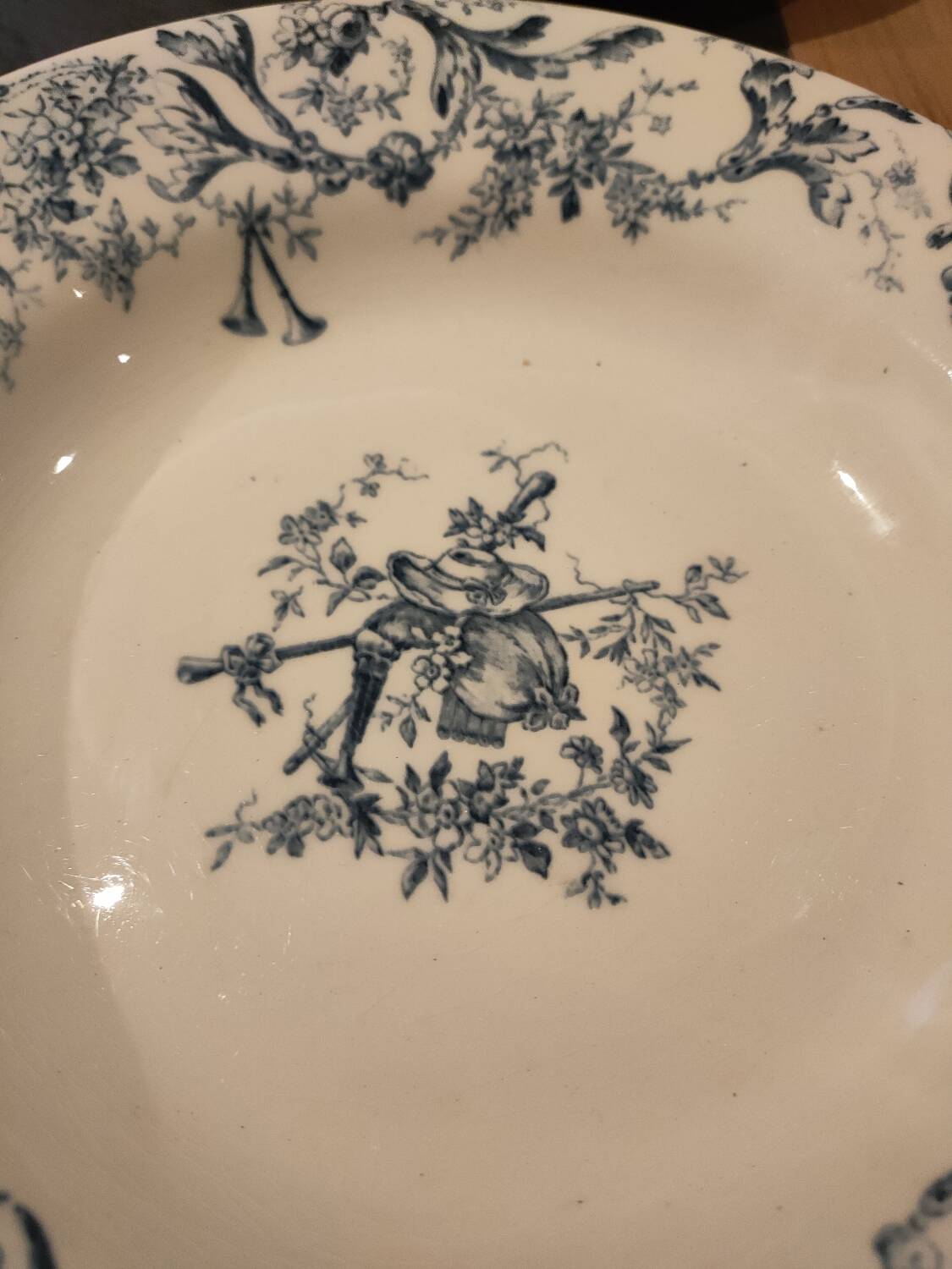 Service of old Gien earthenware plates and dishes