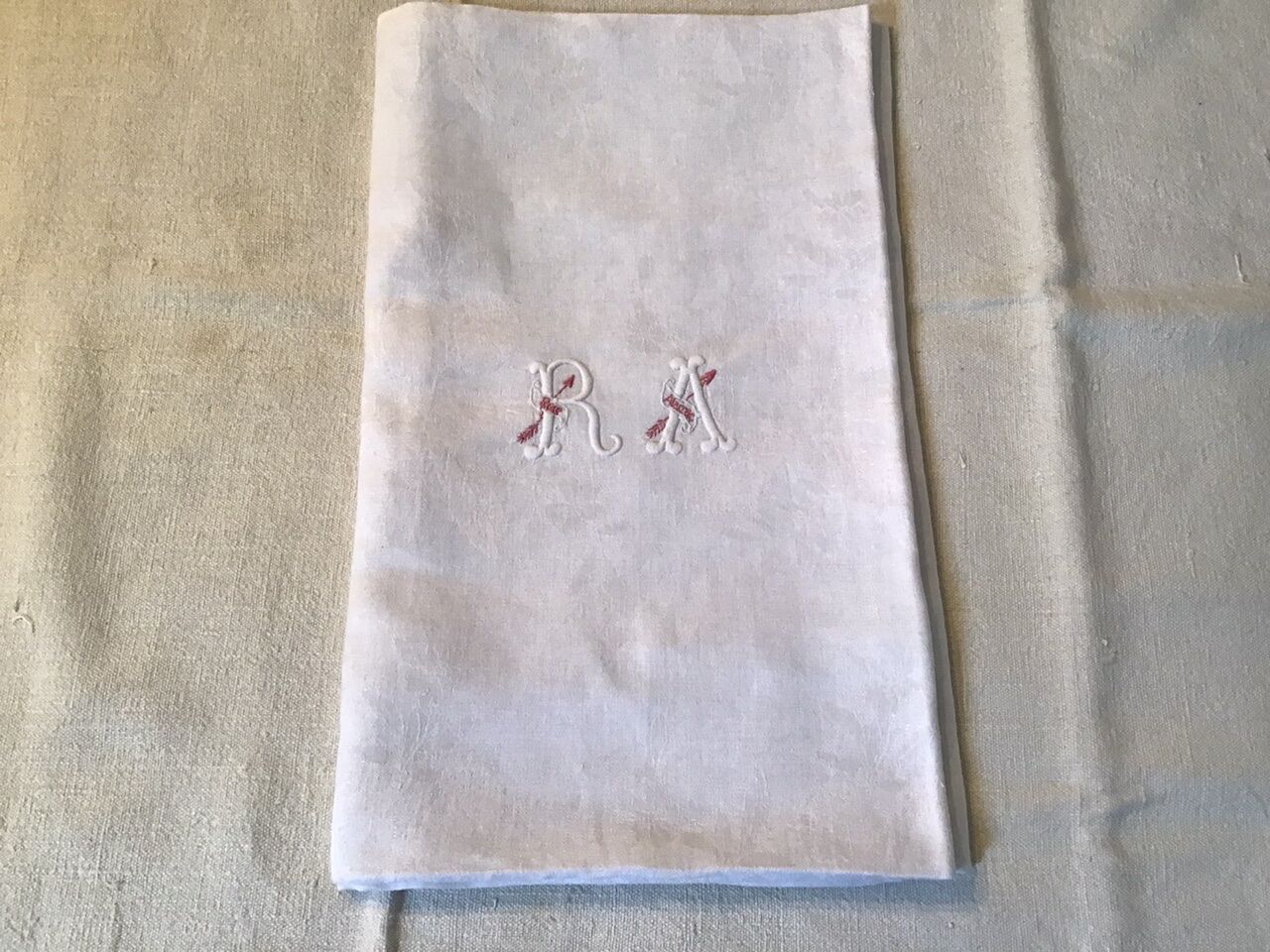 Square linen tablecloth marked RA