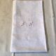 Square linen tablecloth marked RA