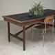 Vintage workshop folding table in oak with a hand-patinated black top.