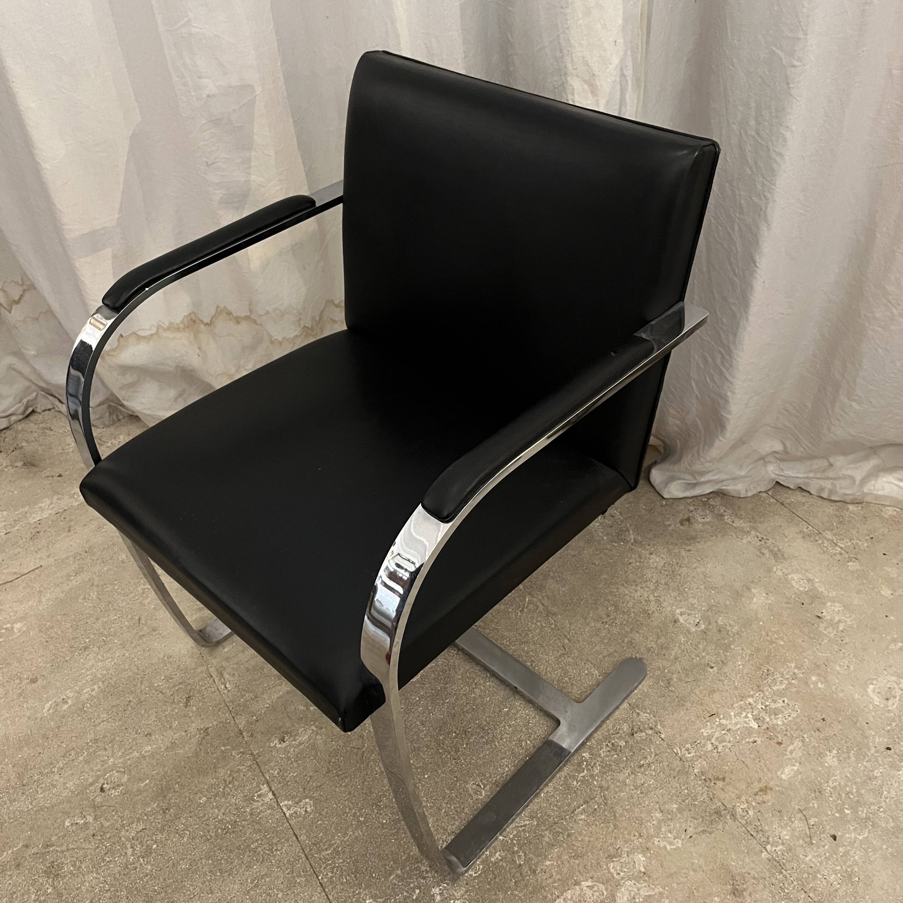 vintage flat steel armchair