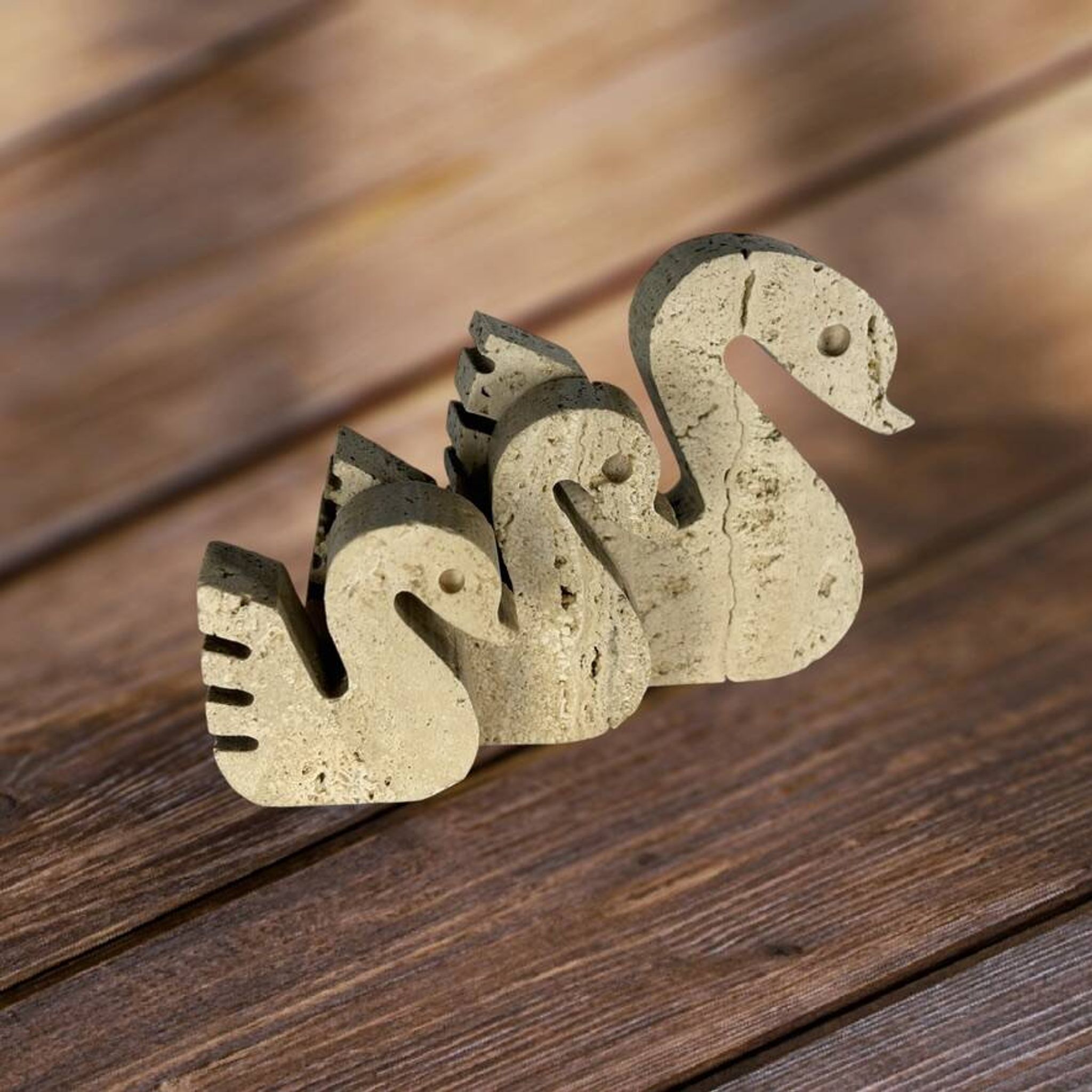Swans Enzo Mari travertine for Fratelli Mannelli, Italy, 1970.