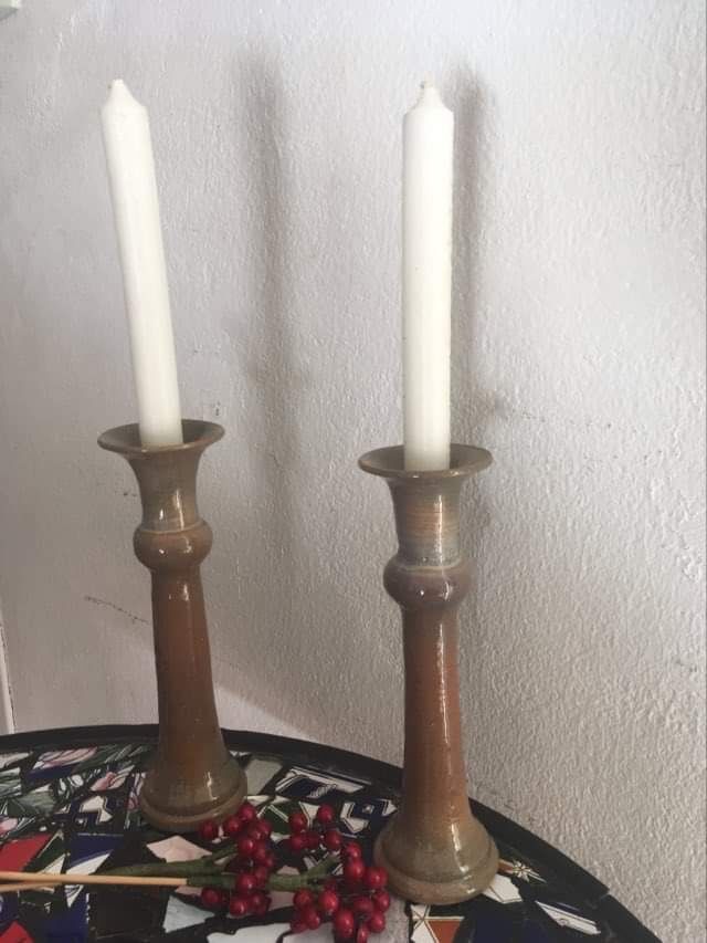 Terracotta candlesticks signed