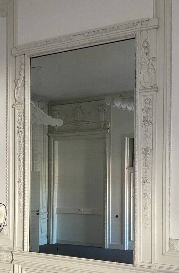Louis XVI style mirror in wood and carved stucco 20th century