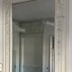 Louis XVI style mirror in wood and carved stucco 20th century
