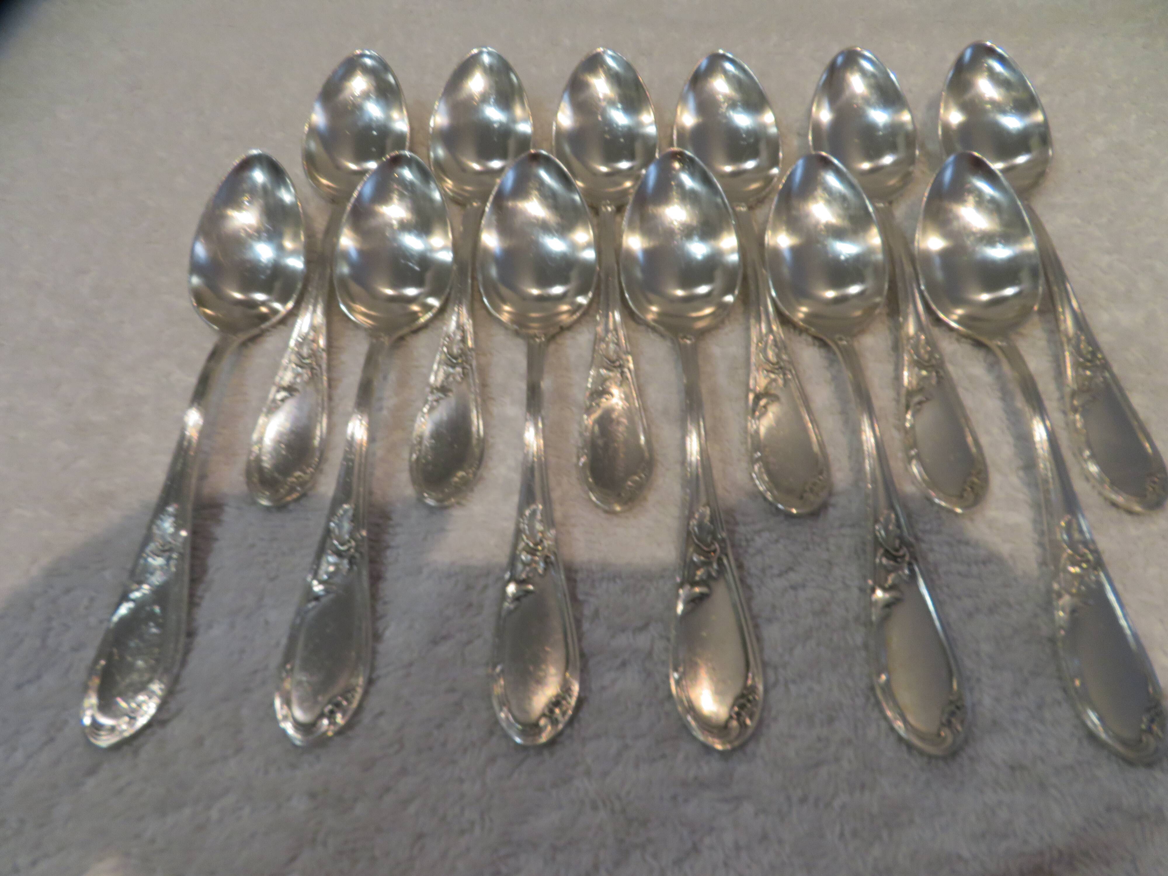 12 silver-plated metal teaspoons, goldsmith J Brille, rocaille ribbon decor